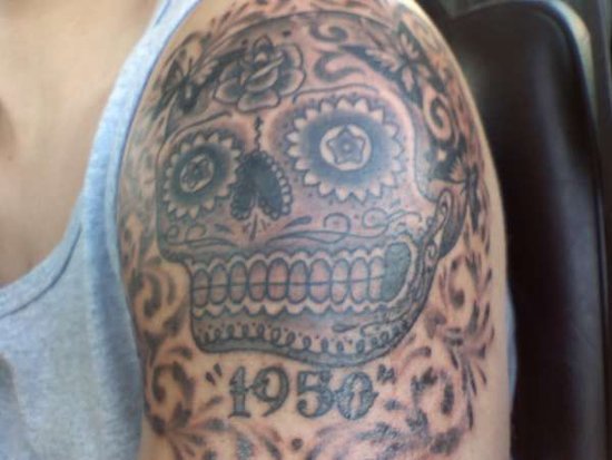 day of the dead skull tattoo. pictures of tattoos of crosses