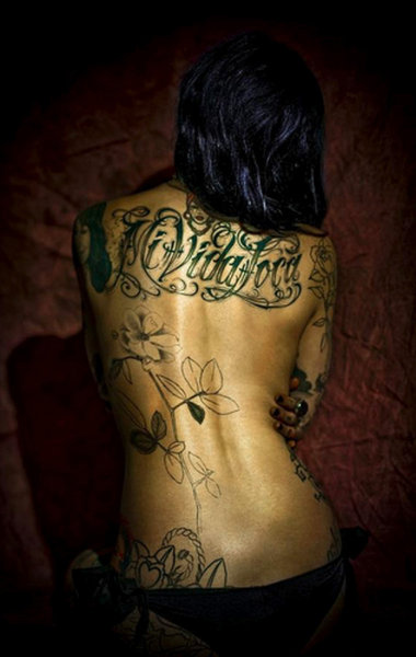 tattoo on her spine.
