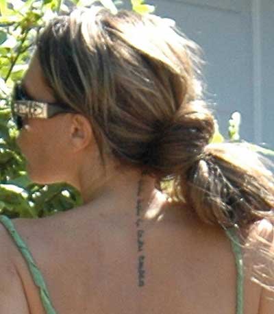 victoria beckham tattoo on neck. Victoria Beckham has a new