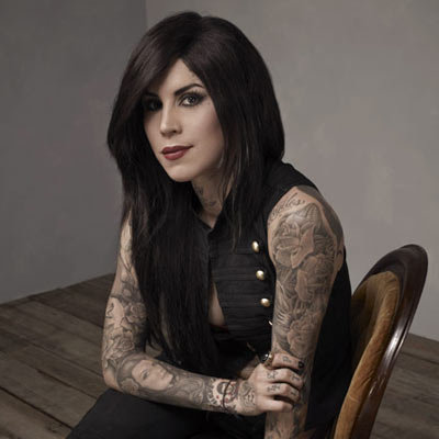  her work as a tattoo artist on the TLC reality television show LA Ink 