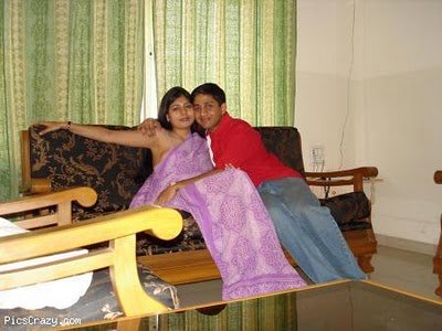 Beautiful and Hot Couple sit on Sofa