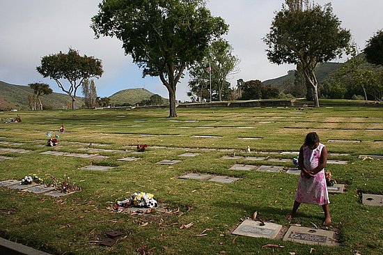 Visiting sisters grave.