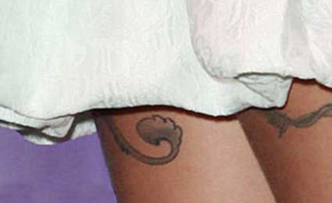 cheryl cole tattoo on bum. cheryl cole tattoo on um.