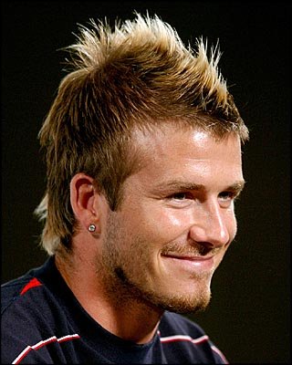 david beckham hairstyle 2011. David Beckham Faux Hawk