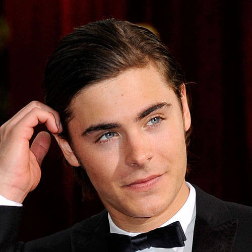 zac efron hairstyles. pictures of zac efron in 2011.