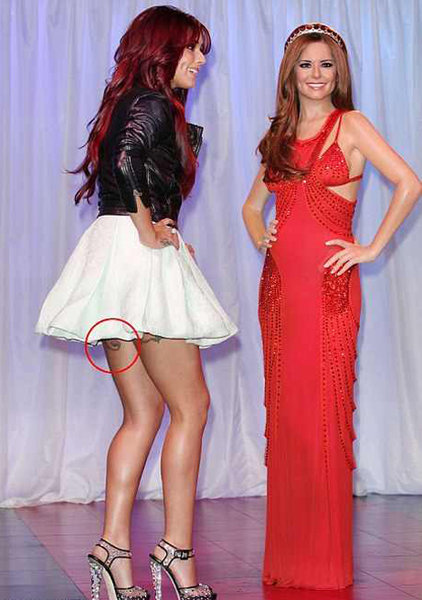 Cheryl Cole was sporting what appeared to be a new tattoo on her left leg as 