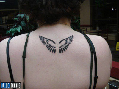 small tattoos designs. small angel wing tattoos