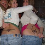 two-college-girls-with-tramp-stamp-tattoos