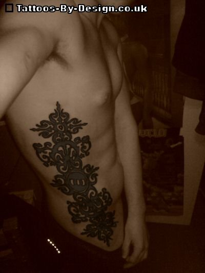 Joshs side chest tattoo