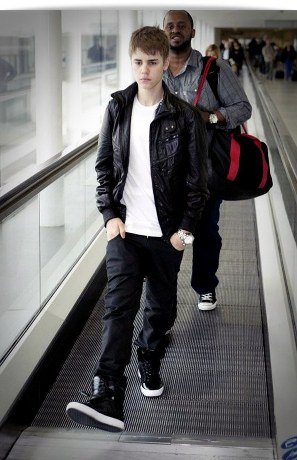 justin bieber leather jacket 2011. Justin Bieber at Heathrow