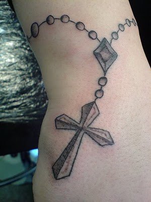 rosary beads tattoo. rosary beads tattoos