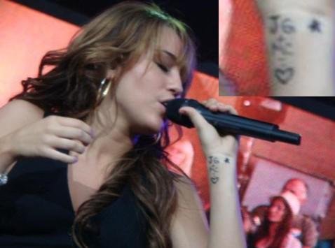 miley cyrus tattoo of justin bieber. justin bieber album cover,