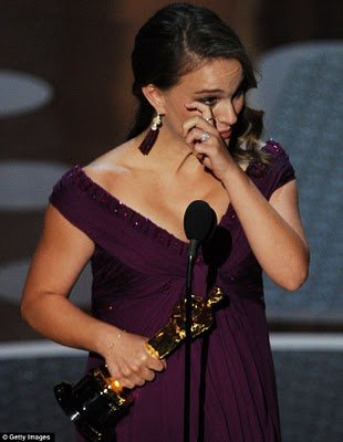 natalie portman baby bump 2011. Natalie Portman wipes away a