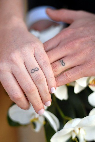 wedding ring tattoos. infinity wedding rings