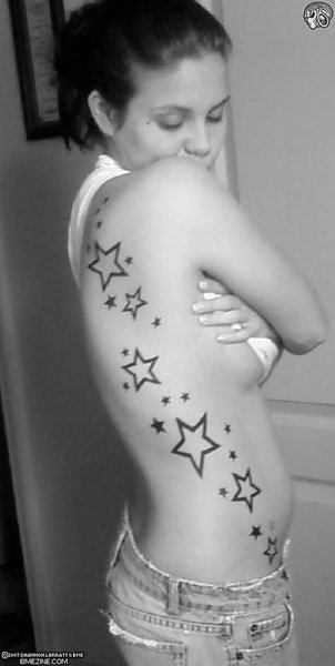 star tattoo on side of body. tattoo on side Body tribal