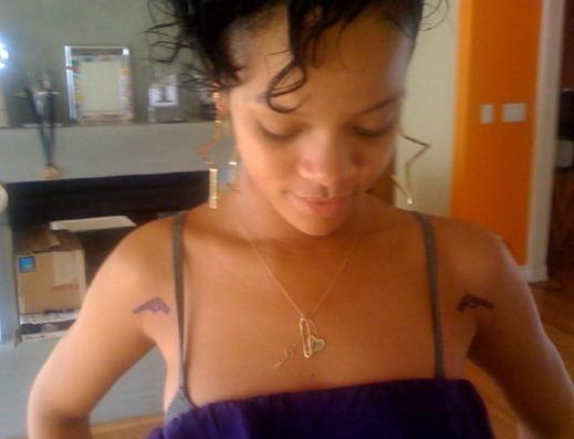 rihanna tattoos and meanings. rihanna tattoos and meanings.