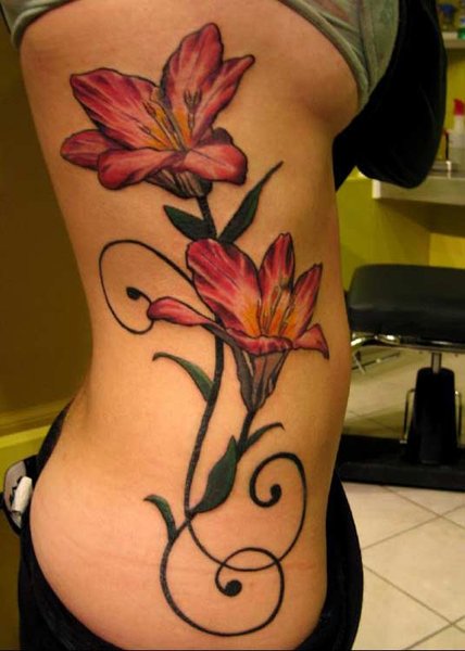 female rib tattoos. rib flower tattoo women sexy,