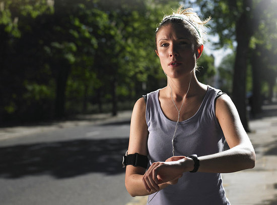 woman running with watch woman running with watch