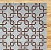 An Indoor-Outdoor Rug Helps Keep Things Tidy