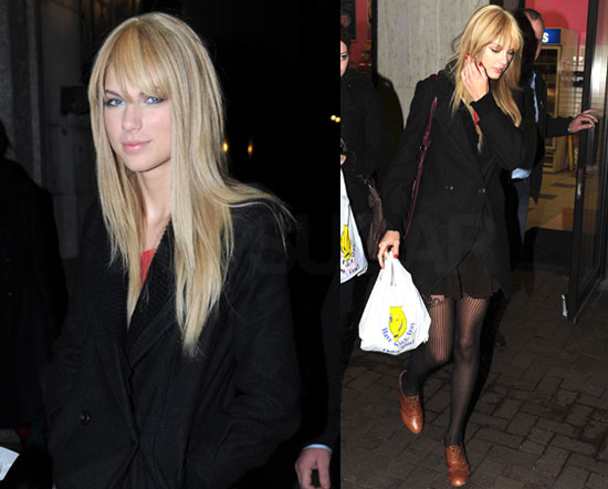 taylor swift with straight hair bangs. To see more of Taylor just