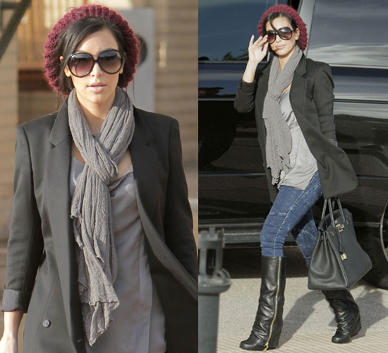 Photo of Kim Kardashian Wearing Zipper Boots and Red Beret While Shopping in