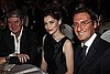 Louis Vuitton chairman Yves Carcelle, Laetitia Casta, Louis Vuitton head of marketing Pietro Beccari