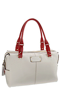 picture of white Kate Spade satchel with red handles on a white background