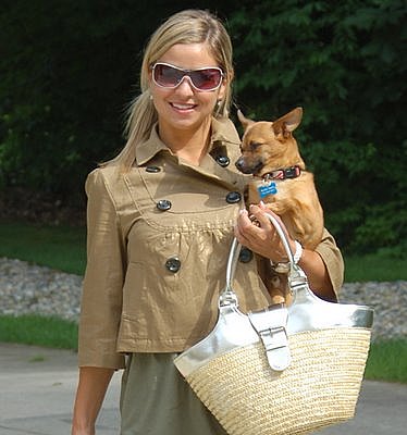 woman with Chihuahua dog and Mossimo gold cropped jacket and jeans