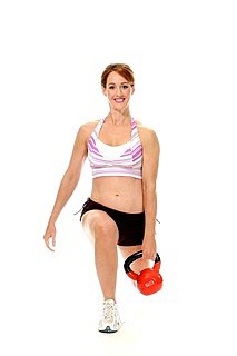 picture of woman working out with kettlebell