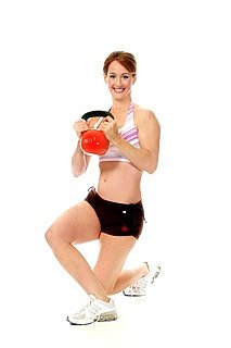 picture of woman working out with kettlebell