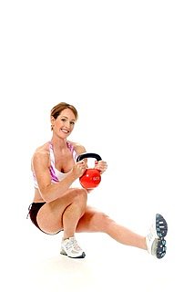 picture of woman working out with kettlebell