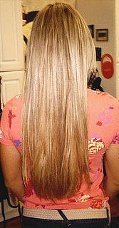 picture of back of woman with long blonde hair almost to her belt