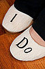 My sister added letters to a new pair of slippers.