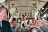 Having a toast on the trolley that took us from the church to the reception.