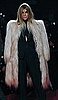 Carine Roitfeld wearing strong-shouldered fur in May 2009.