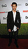 Taylor Lautner Looking Cool and Collected in Black and White