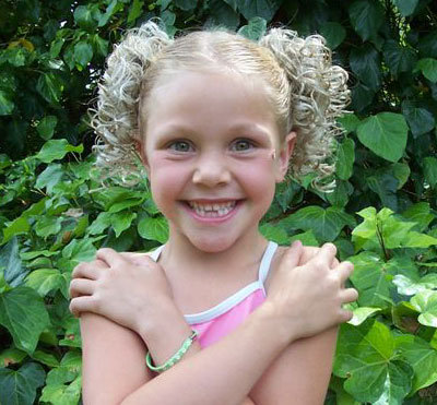 These are pictures of some classic ponytail hairstyles for little kids.