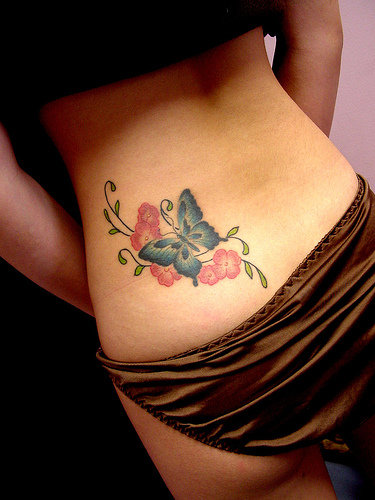 Lower Back Tattoos With Flower Butterfly Tattoo Design