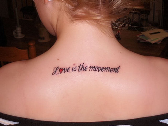 Girl Tattoo On The Back With Text Tattoo Design Love Is The Movement