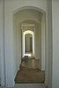 I had these great arched hallways and wanted to give them a bit of color. Also, the floors were stock carpet and tiles, so I wan