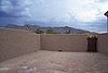 My backyard on a summer day with the monsoon coming towards us in the distance. Like most new purchase homes, my backyard was a 