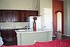 More pics of kitchen. Les white. More bright. 