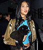 Model Kimora Lee Simmons with her dog, Zoe, attend the Sean John Fall 2001 collection show at New York's Fashion Week on Februar