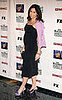 Newly pregnant Minnie Driver showed off her mini bump.
