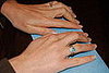 Fold the paper in half length wise.