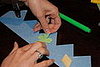Gluing on details.