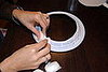 Start to press the cotton balls onto the plate.