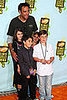 Brad Garrett had lots of lil company on the orange carpet.