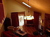 Draperies with woven wood shades and decorative traversing pole.  East Hampton, NY