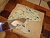 Spread the cheese generously but not so much that it oozes out the sides